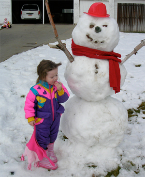 Megan with her snowman Megan with her snowman